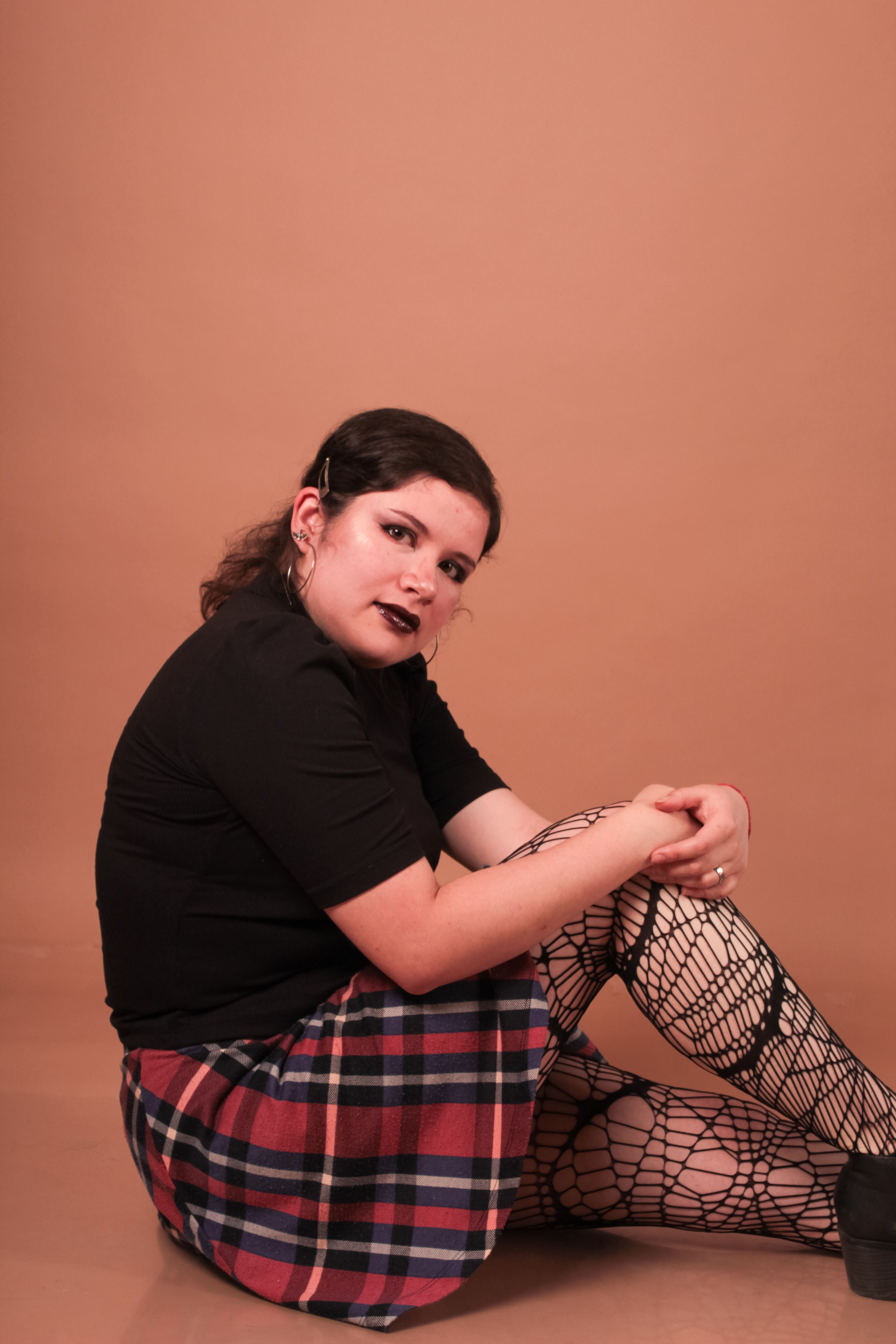 Fashion Portrait of Woman in Plaid Skirt · Free Stock Photo