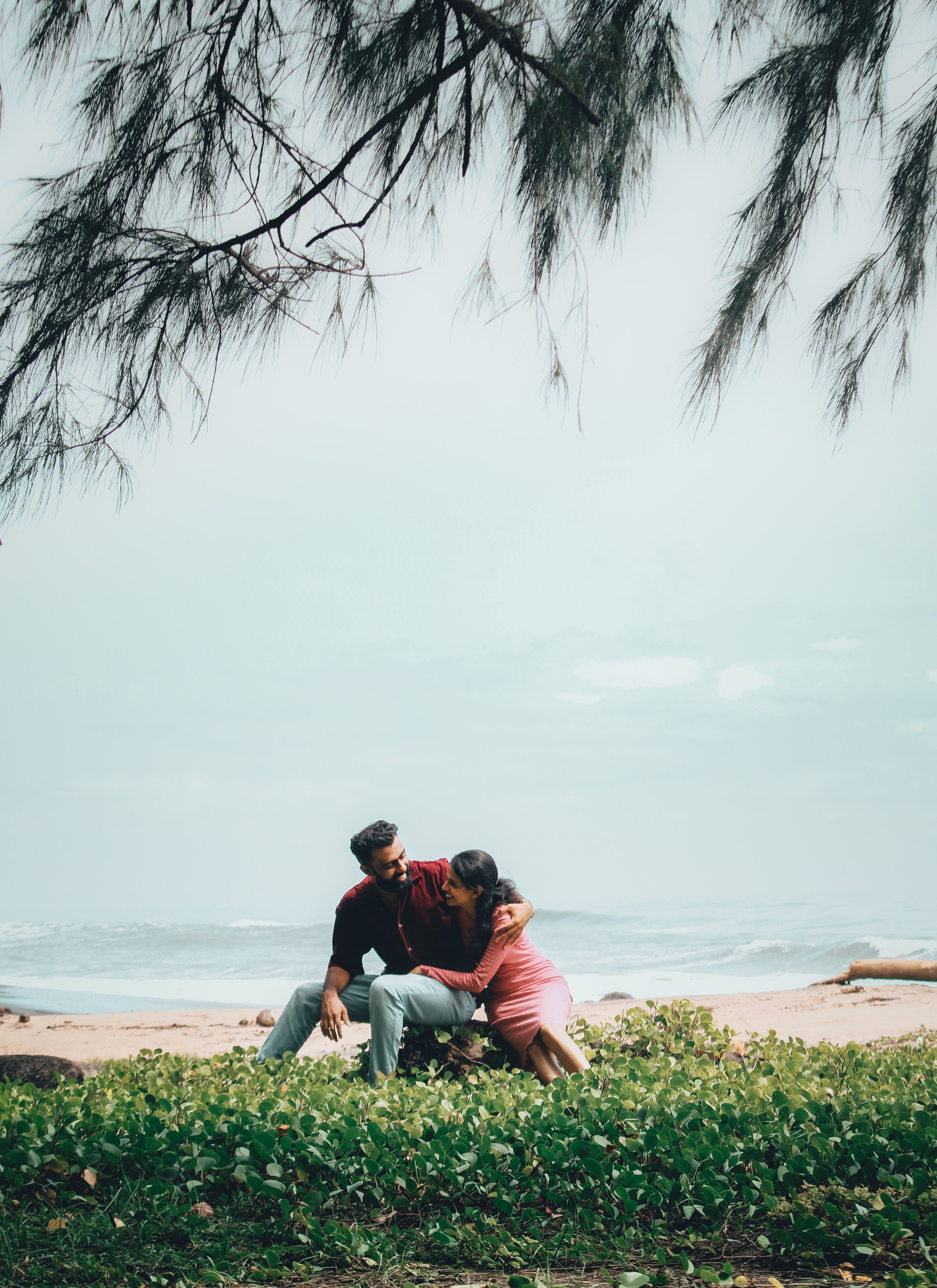 couple with dog traveling in nature