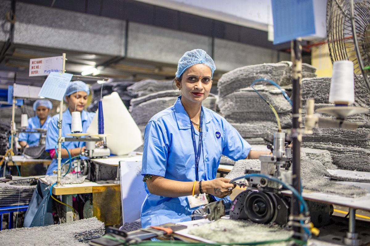 Textile Factory Manager Textile Factory Workers Packaging Products Efficiently · Free Stock Photo