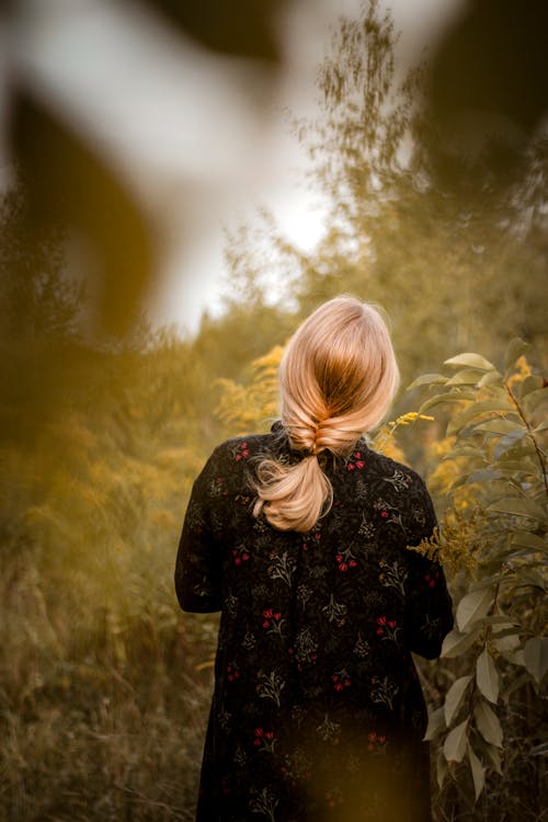 Photo Of Woman Beside Plants