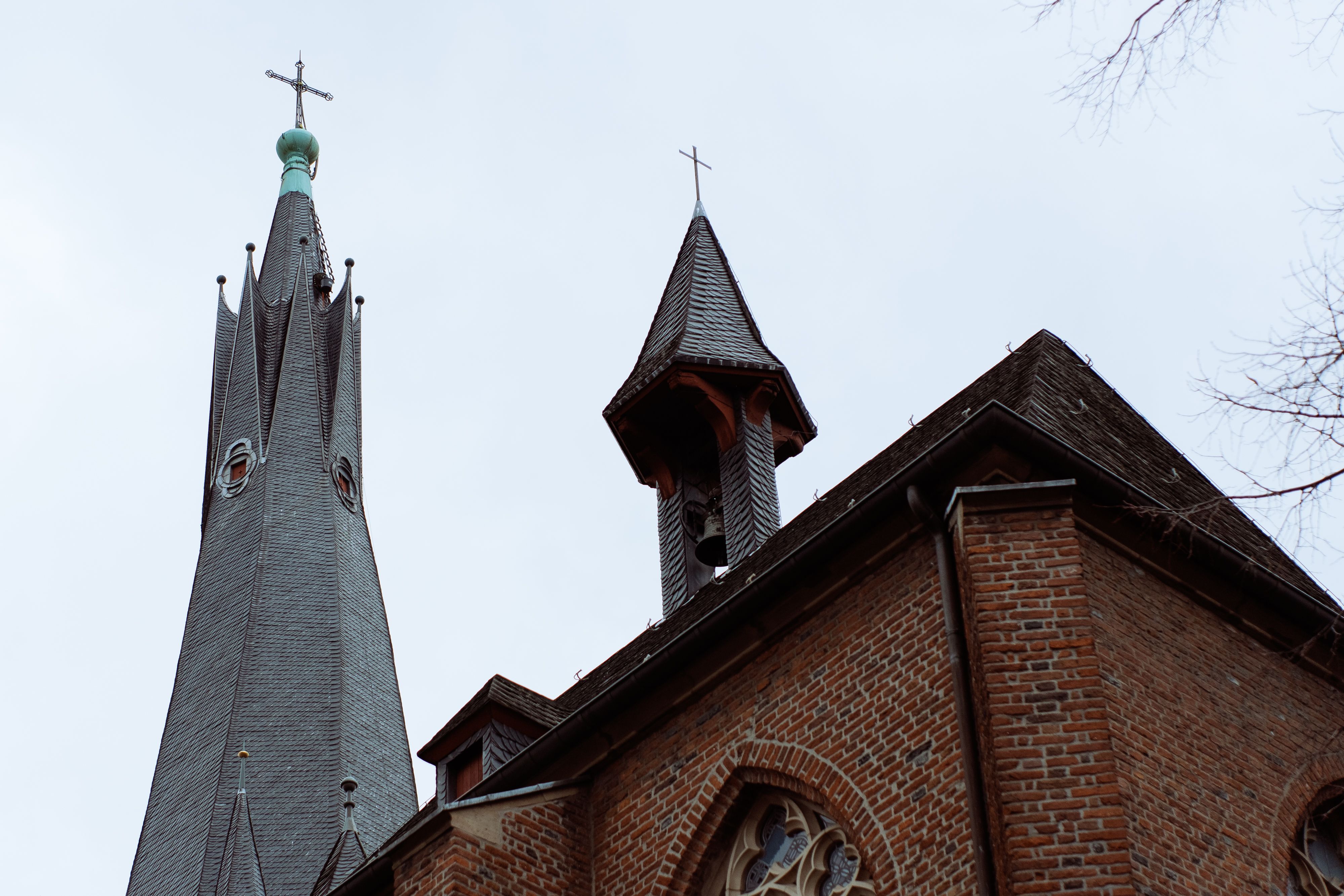 Renaissance church tower rising over brick houses and the Hollandse IJssel at IJsselstein
