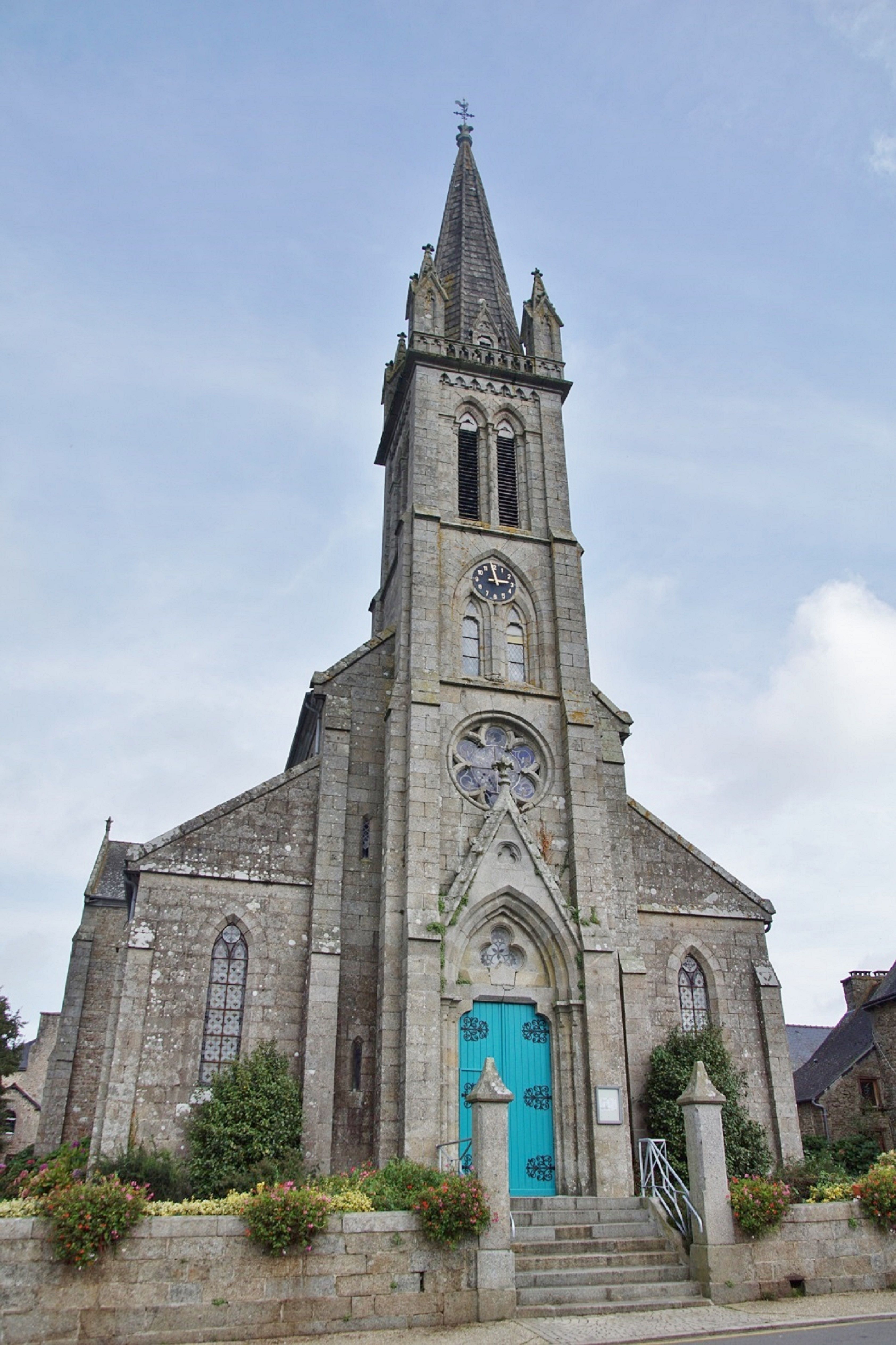 Beautiful Gothic church in Gomené, Brittany, showcasing classic architecture.