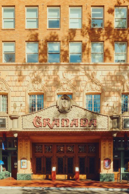 Vintage facade of the Granada Theater on a sunny day in Santa Barbara.