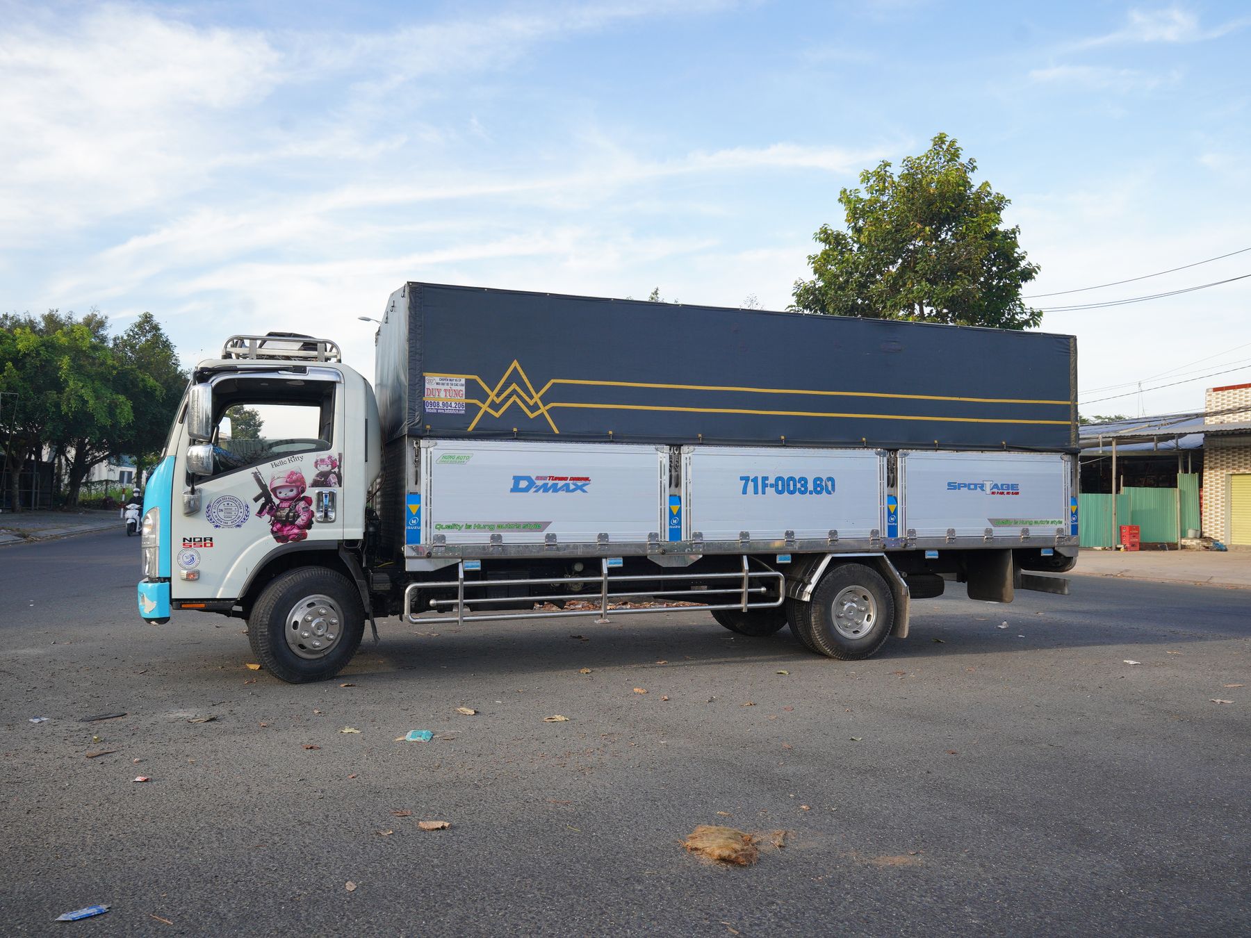 Hampton Wick — man and van team loading a removal van