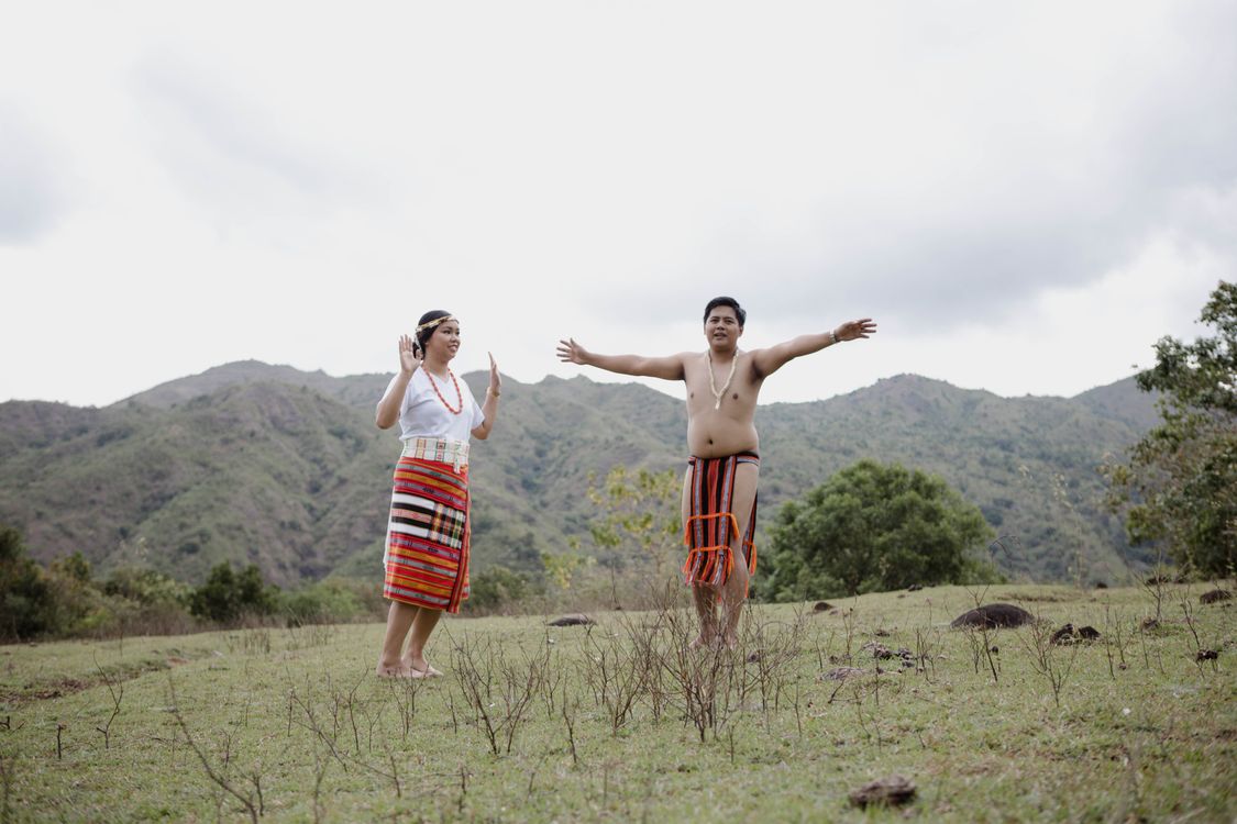 Traditional Filipino Attire in Scenic Mountain Landscape Free Stock Photo Traditional Filipino Attire in Scenic Mountain Landscape Free Stock Photo