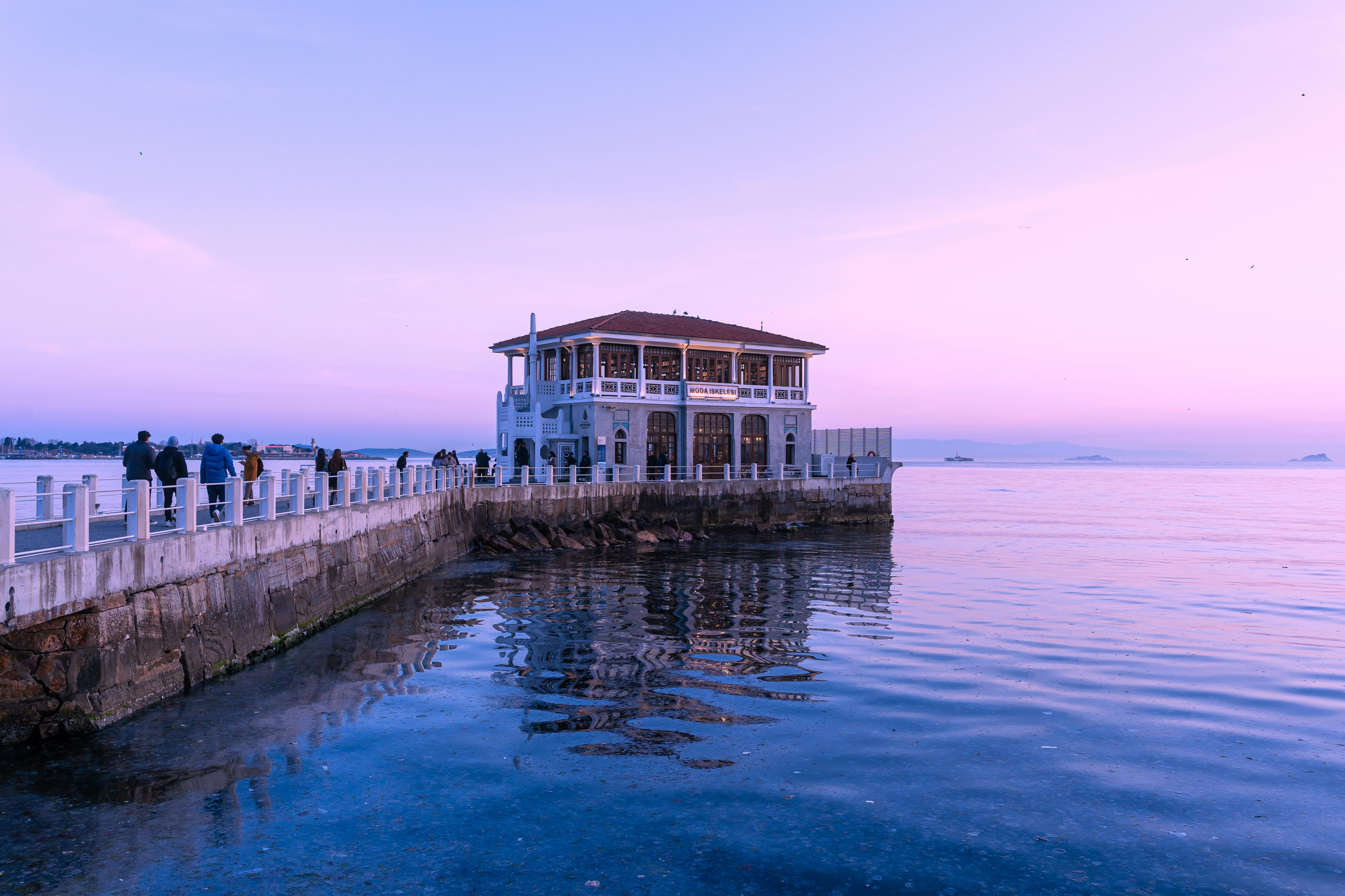 Free Stunning view of a waterfront building at dusk with a serene atmosphere. Stock Photo
