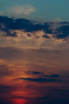 Vibrant sunset with colorful clouds creating a picturesque sky scene.
