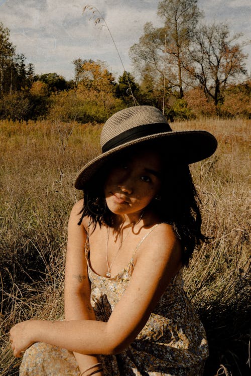 Photo Of Woman Wearing Brown Dress