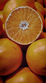 Vibrant close-up of juicy oranges showcasing fresh texture and detail.