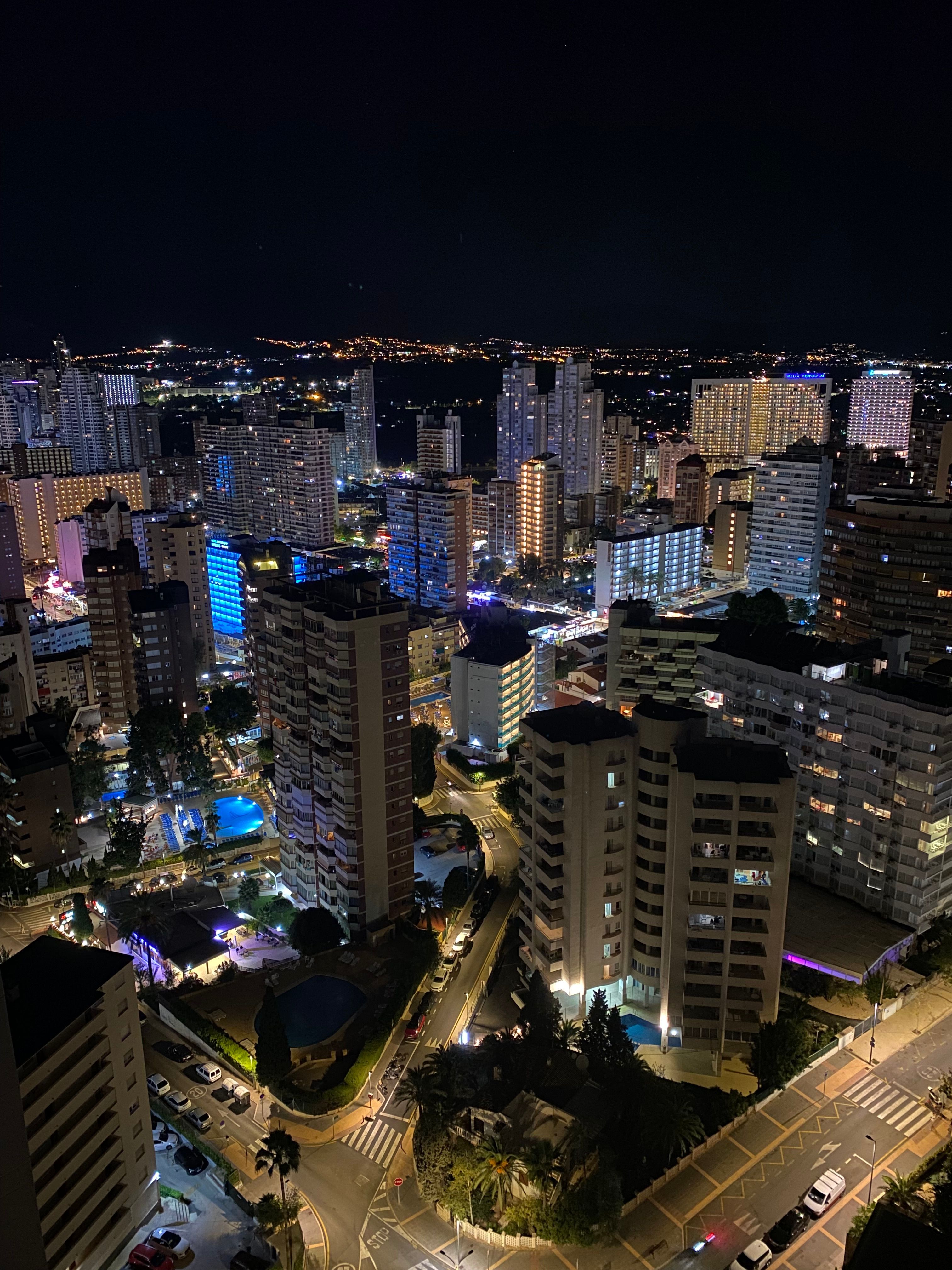 Nighttime Cityscape with Illuminated Skyscrapers · Free Stock Photo