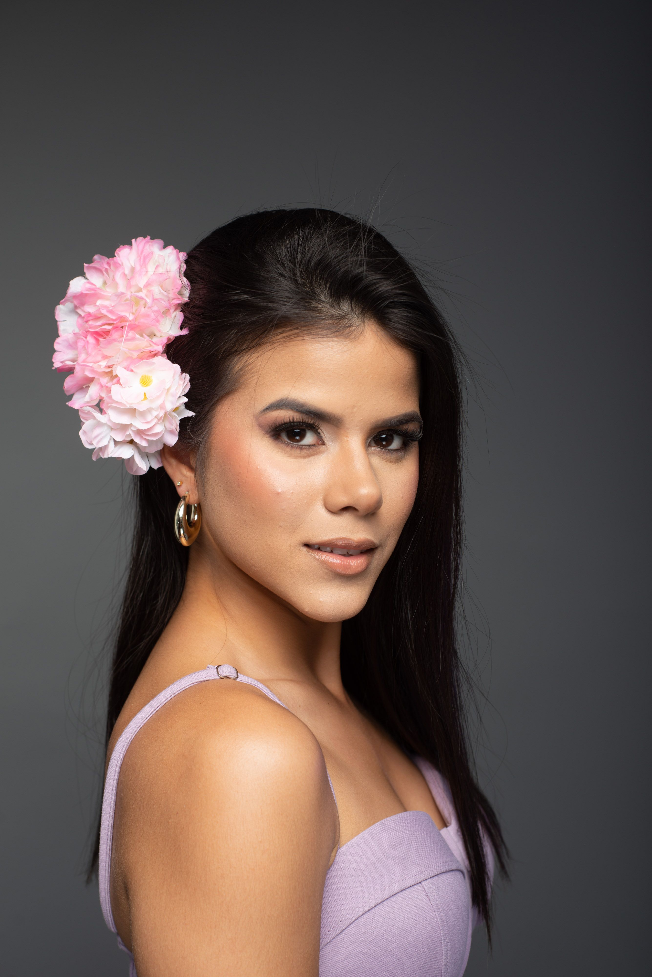 Elegant Portrait of Woman with Floral Hairpiece · Free Stock Photo