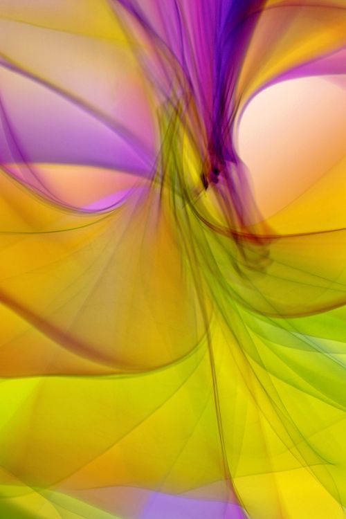 Free Blurred abstract art featuring vibrant swirls of yellow, purple, and green hues. Stock Photo