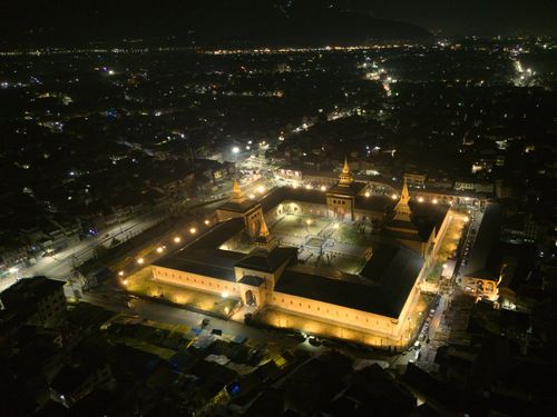 Free Stunning aerial night view of the illuminated Jamia Masjid in Srinagar, Kashmir. Stock Photo