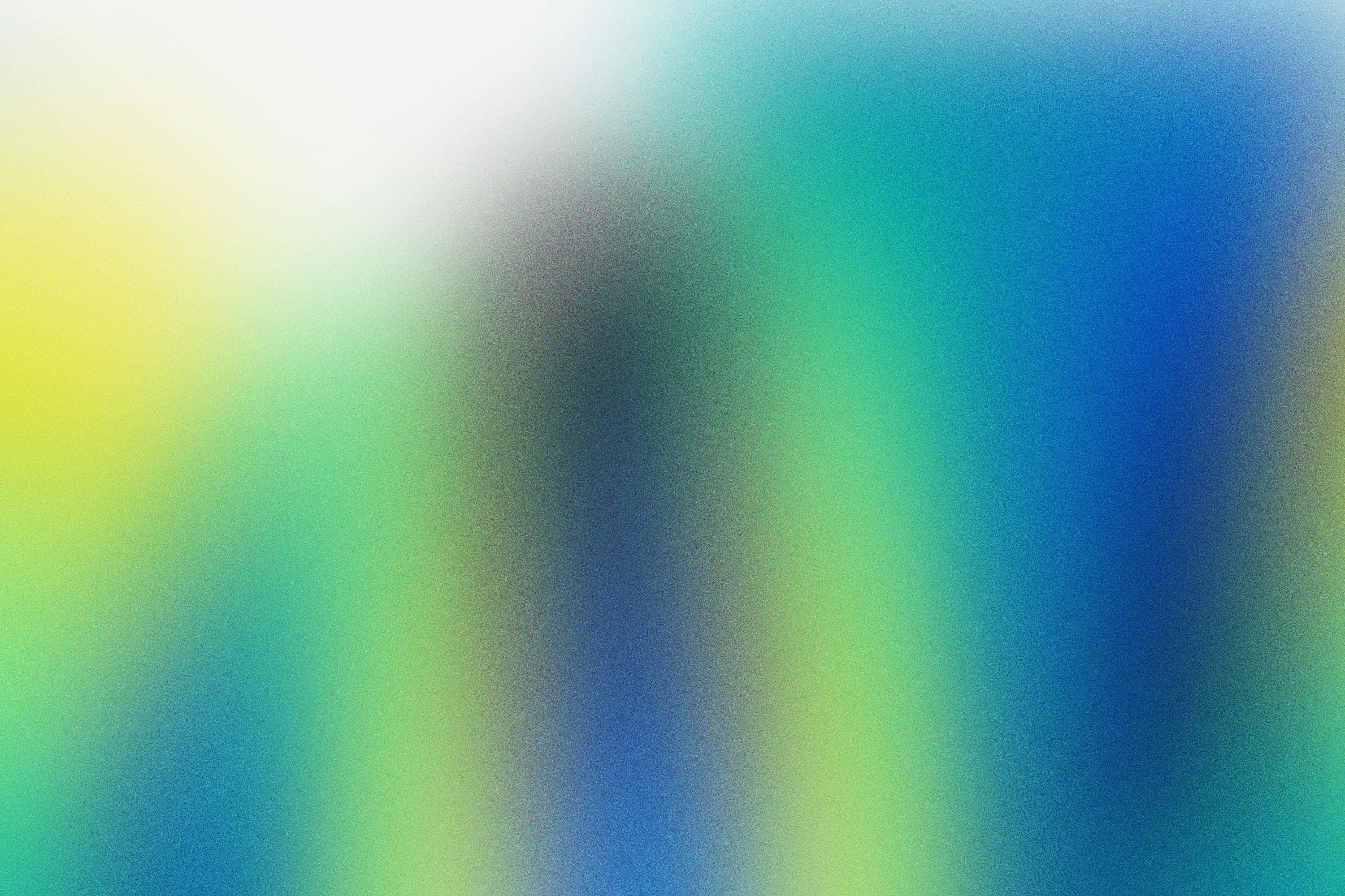 Gratuit Œuvre d'art colorée avec des dégradés fluides dans des tons bleus, verts et jaunes. Photos