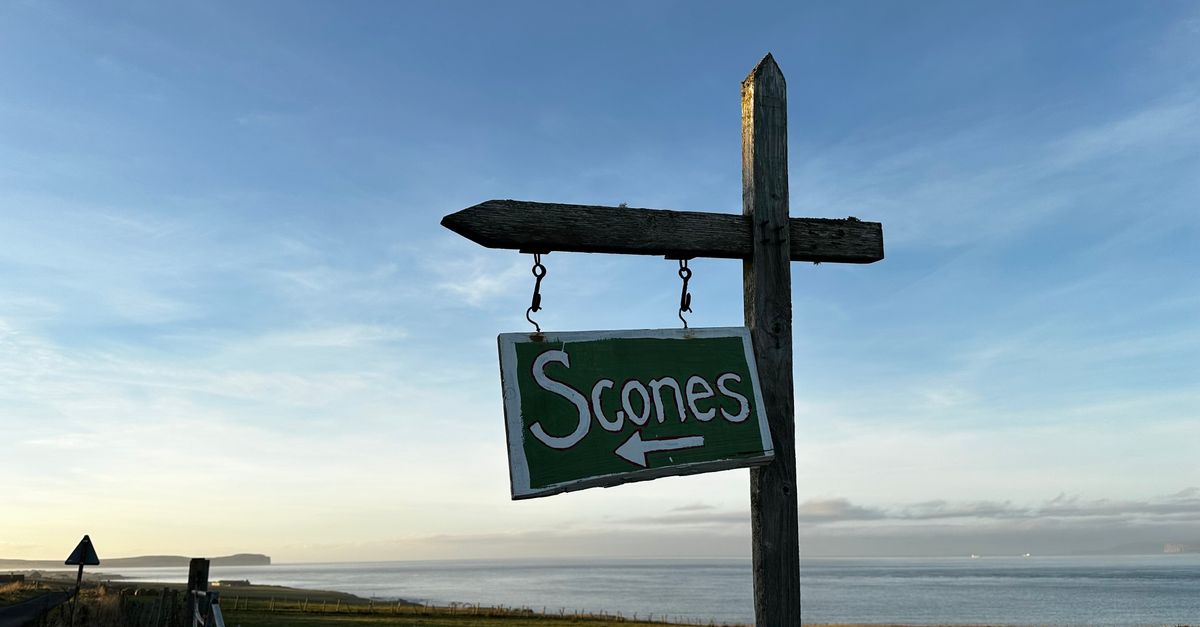 Mini Scone Sign Rustic Sign Pointing to Scones by Seaside · Free Stock Photo