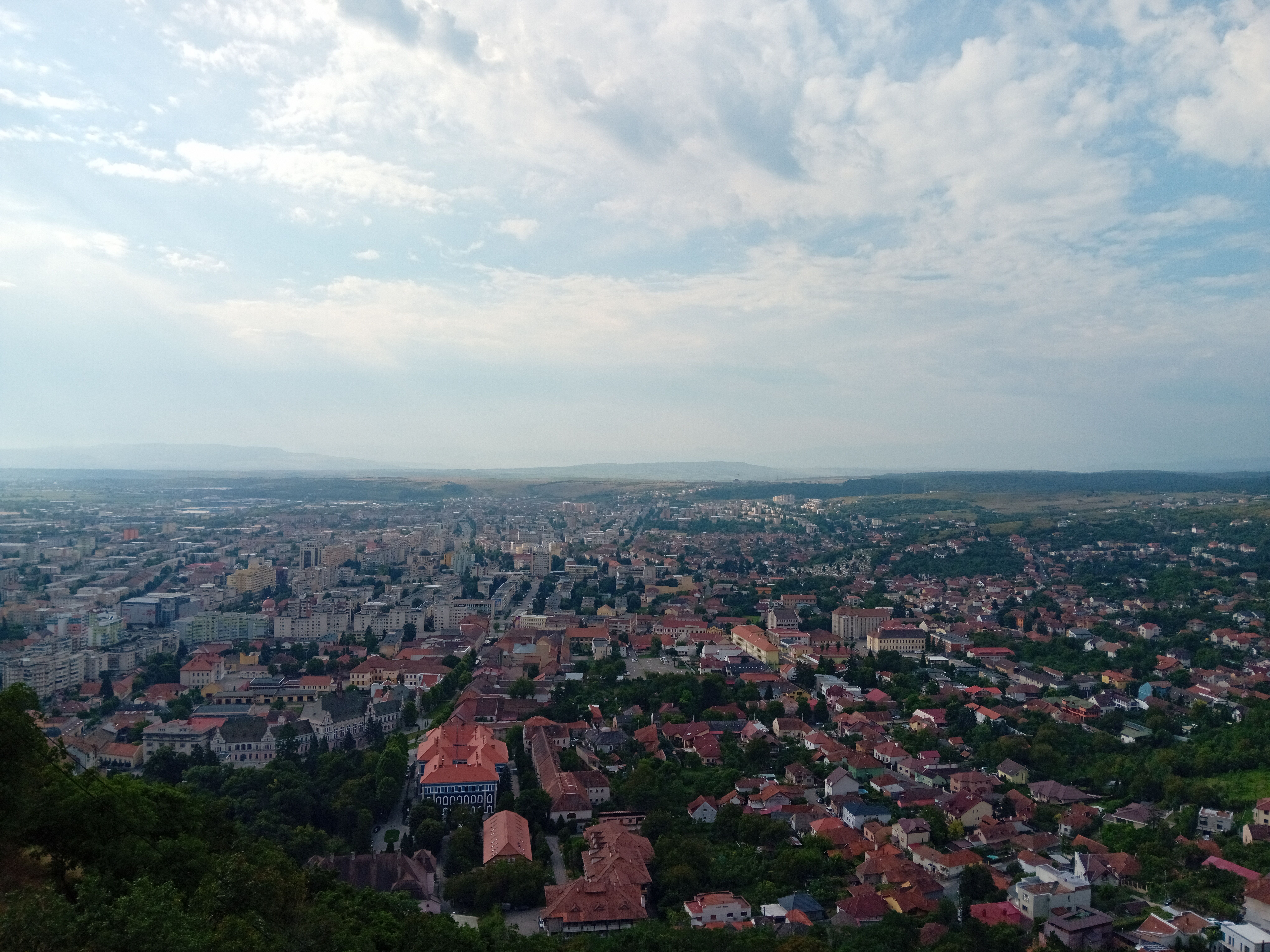Aerial View of Town Under Cloudy Day Sky · Free Stock Photo