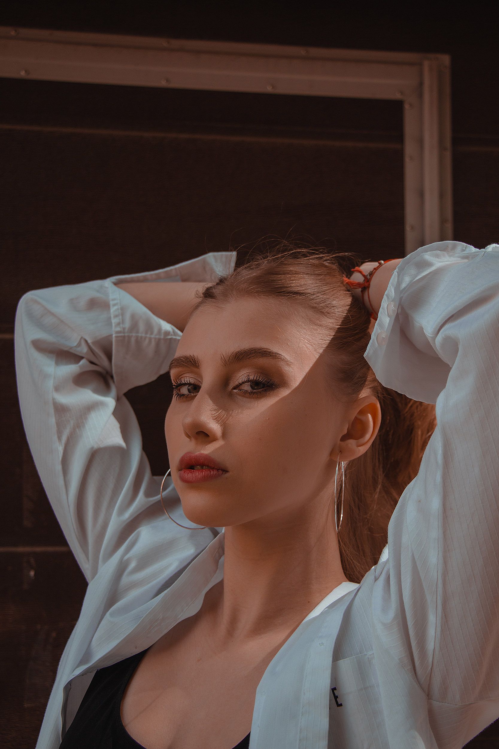 Stylish Young Woman in Natural Light Portrait · Free Stock Photo
