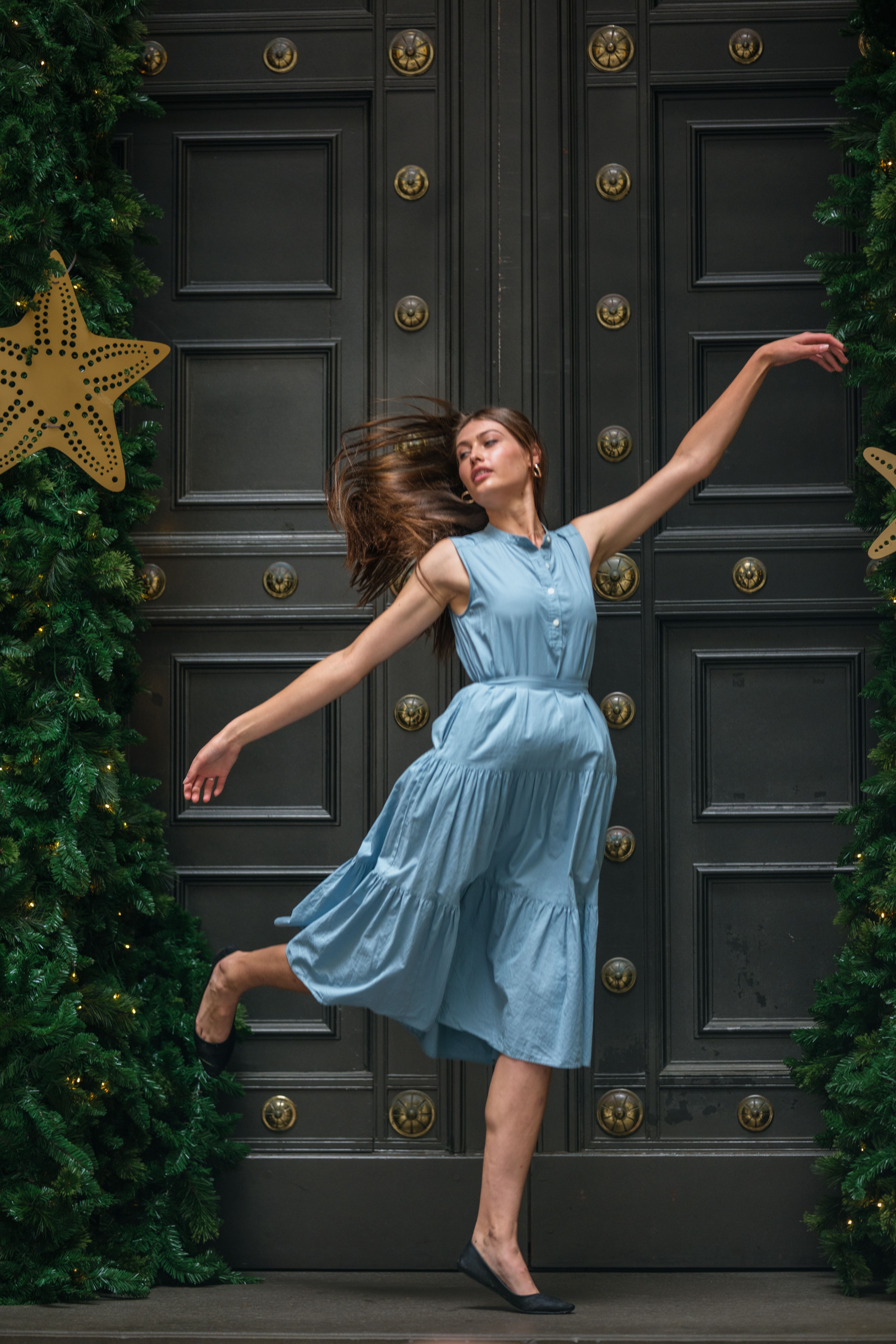 Elegant Dance Pose in Festive Setting · Free Stock Photo