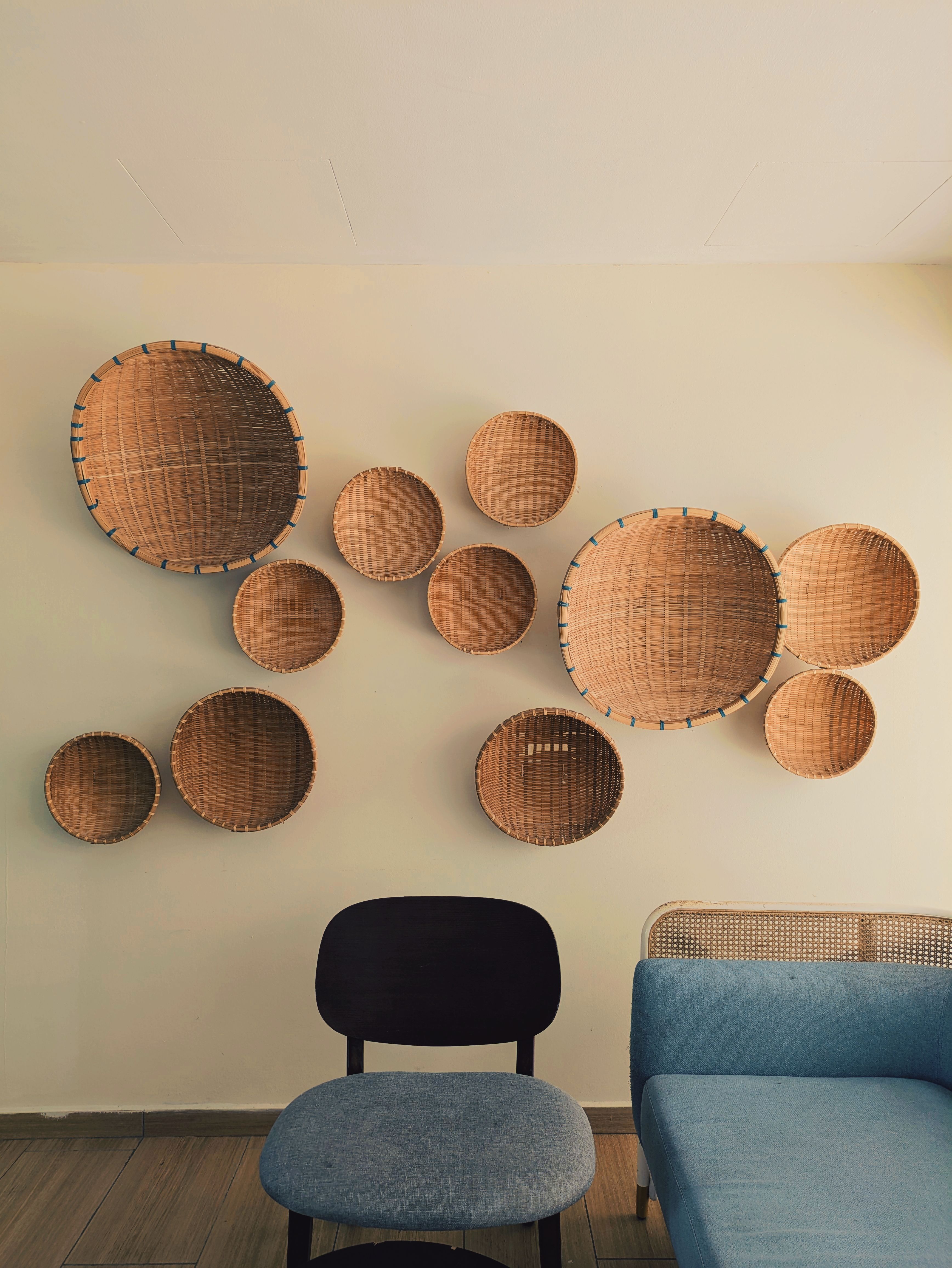 Image showcasing Minimalist Wall Decor with Woven Baskets · Free Stock Photo