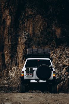 Explore the rugged beauty of Oman with a 4x4 vehicle on an off-road adventure through stunning mountain landscapes.