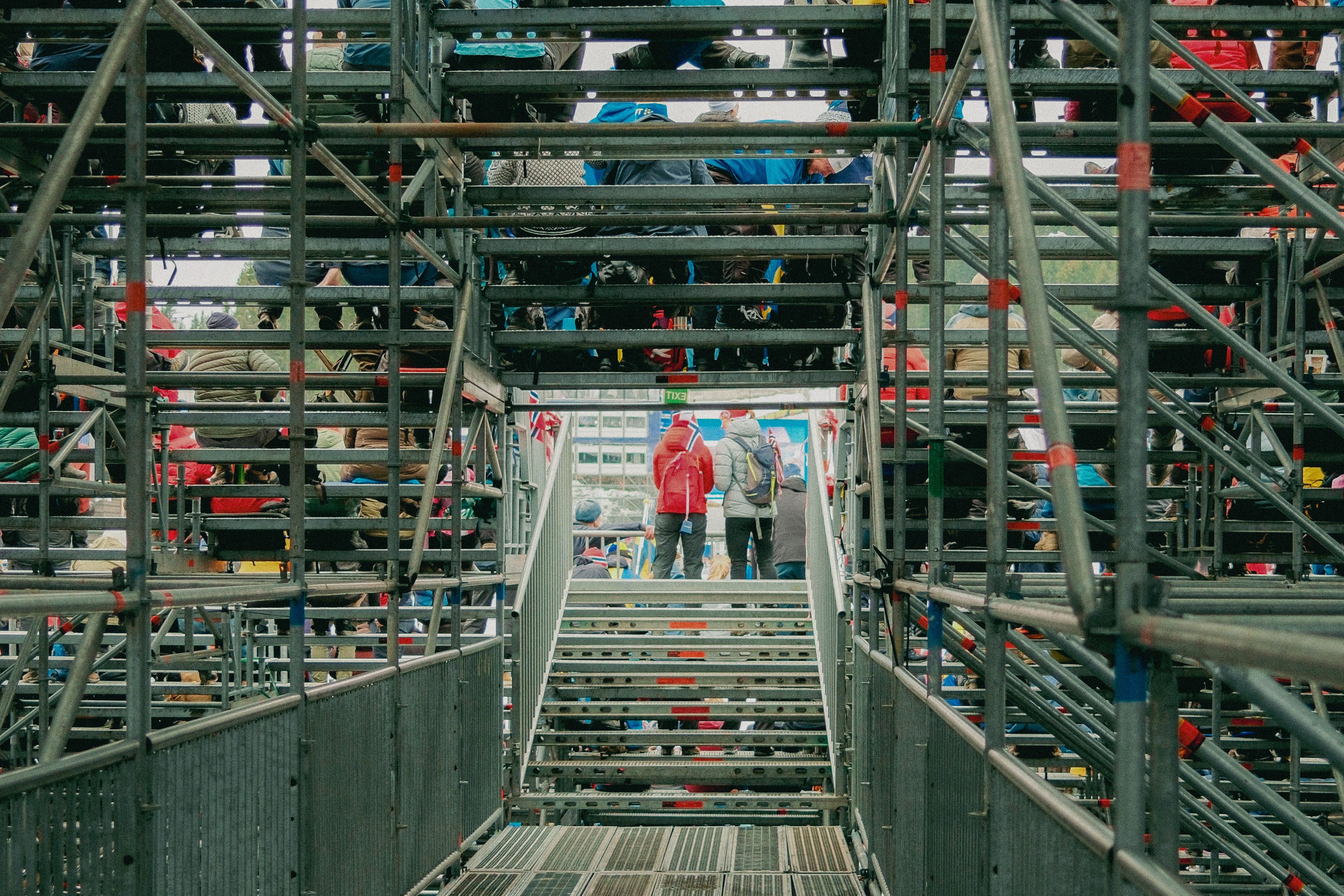Crowd Watching Event from Metal Bleachers · Free Stock Photo