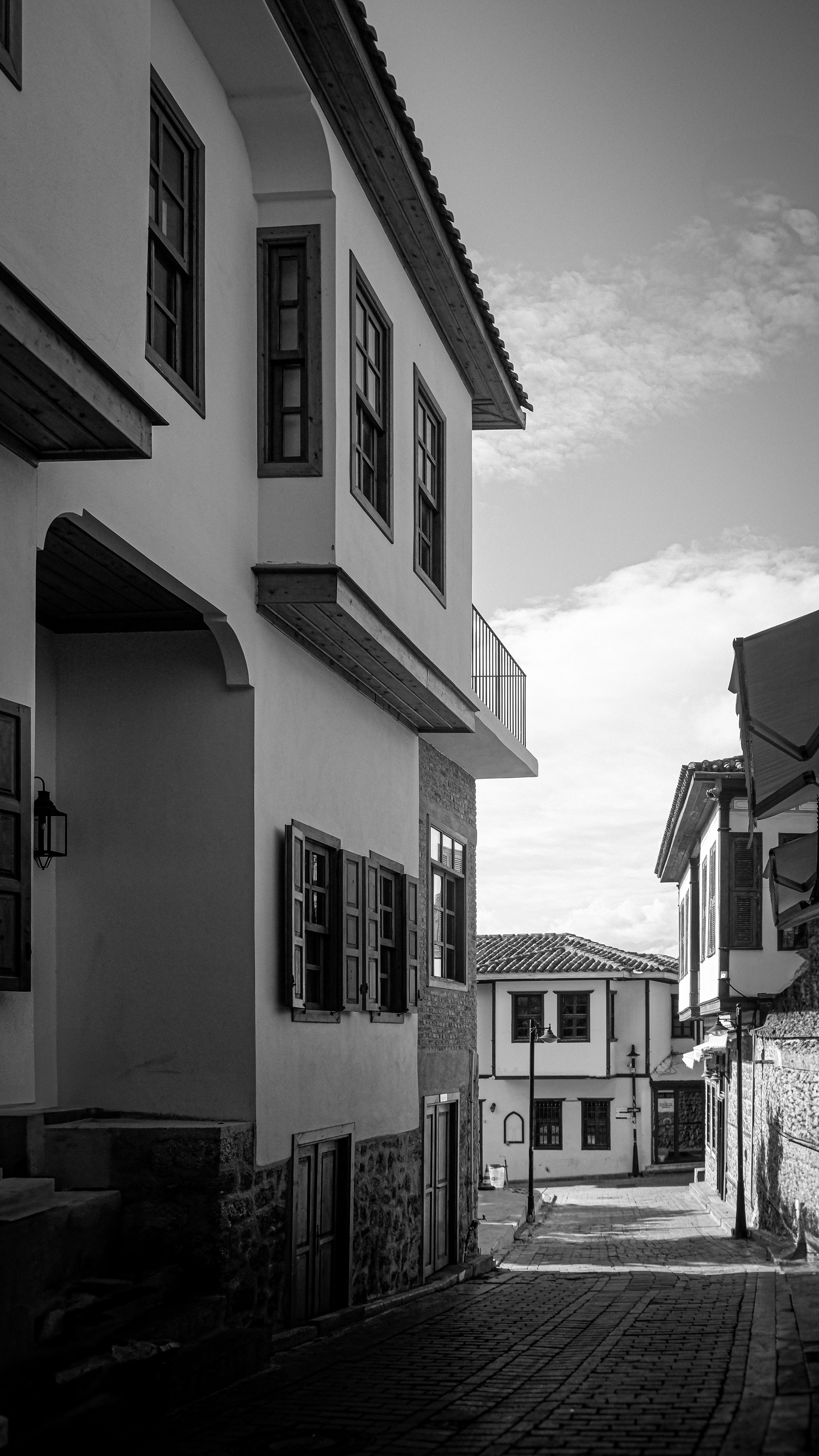 Charming historic alleyway showcasing traditional architecture in a serene setting.