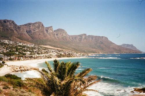 Free A breathtaking seaside view of Camps Bay and the Twelve Apostles mountains in Cape Town, South Africa. Stock Photo