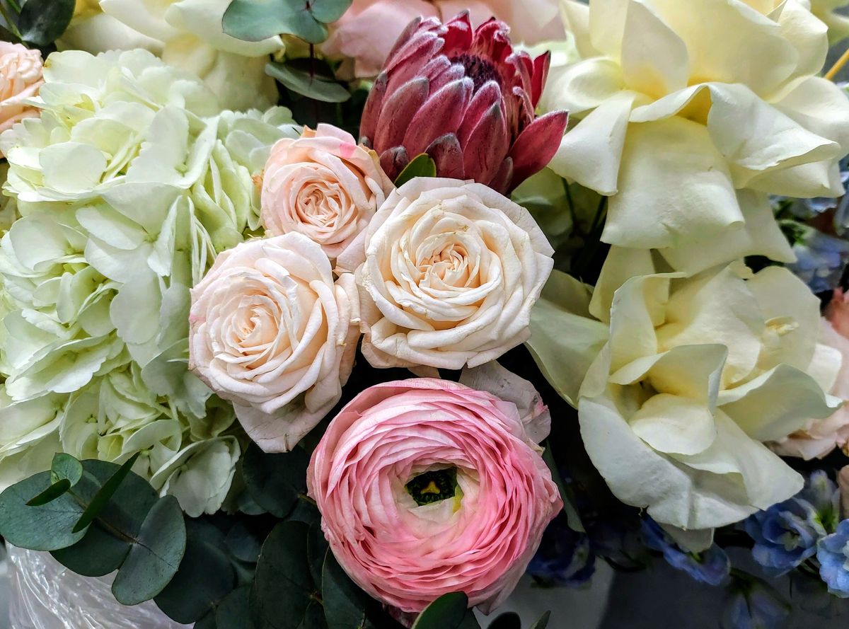 Colorful custom bouquet arranged by Bloom & Wild Florals for a Downtown Charleston delivery