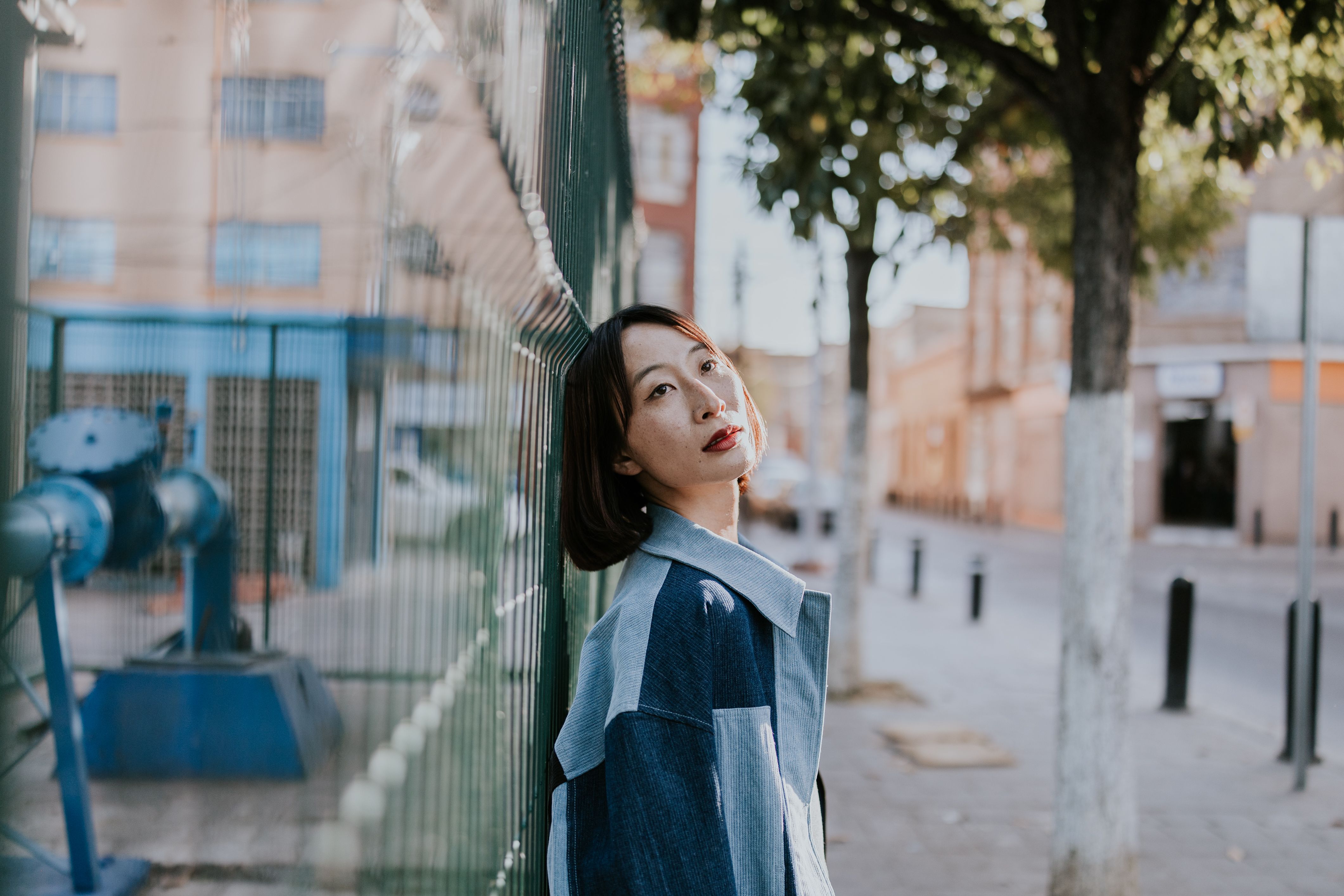 Stylish Woman Posing in Urban Setting · Free Stock Photo