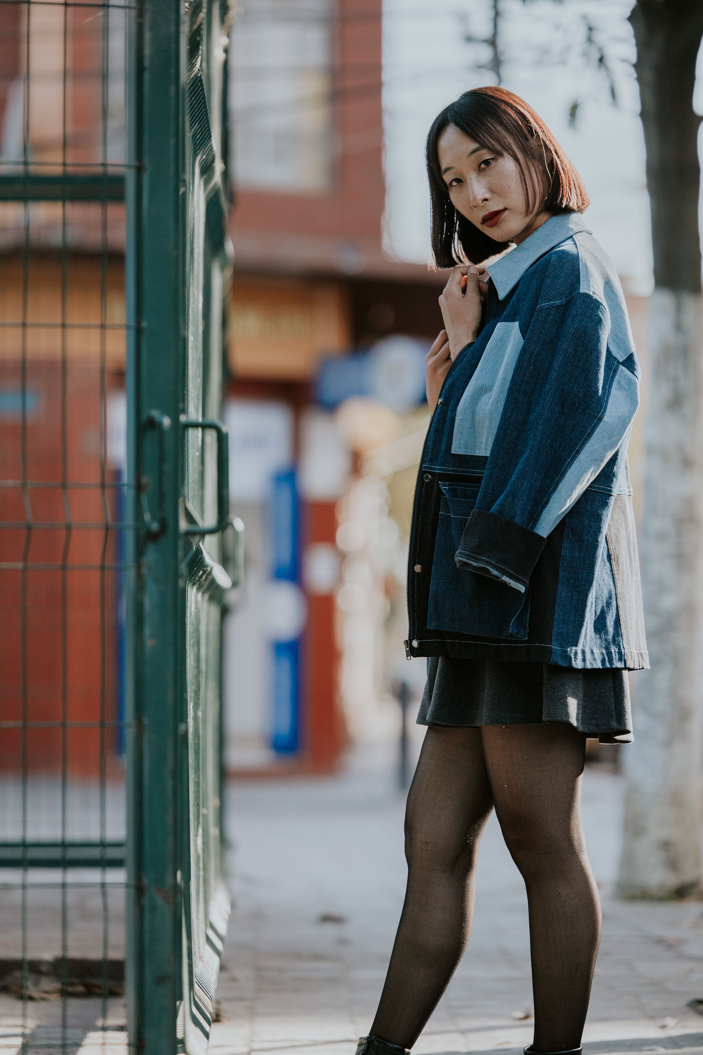 Denim shirt dress with black tights