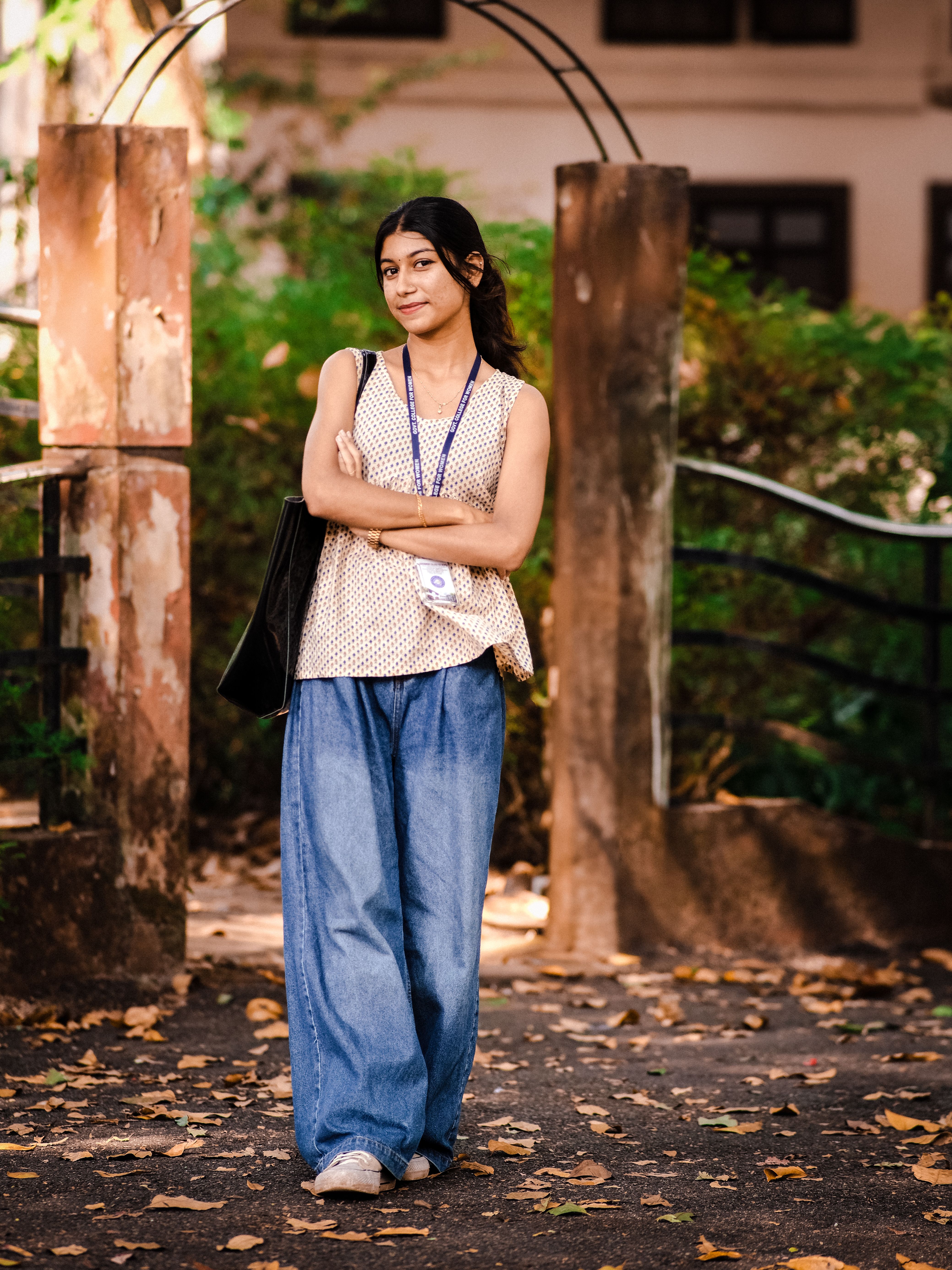 Woman in Casual Outfit Standing Outdoors · Free Stock Photo