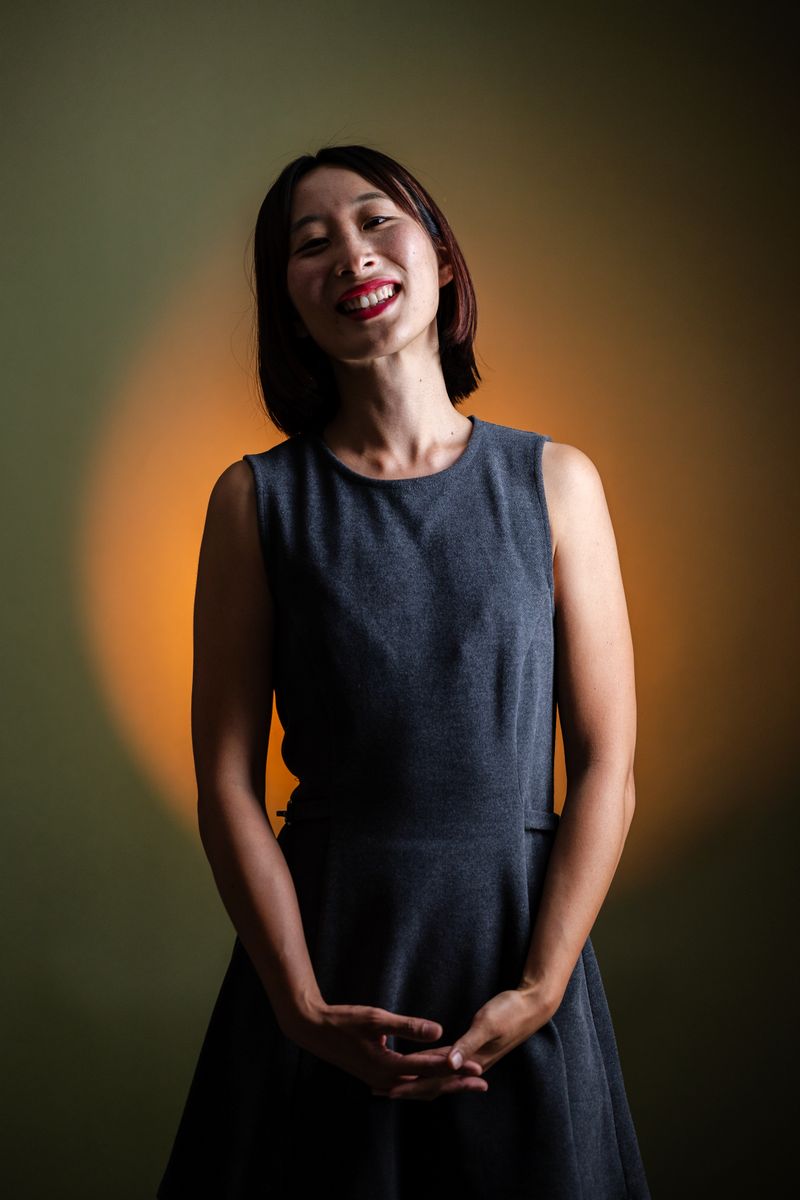 Woman in Black Dress Smiling · Free Stock Photo