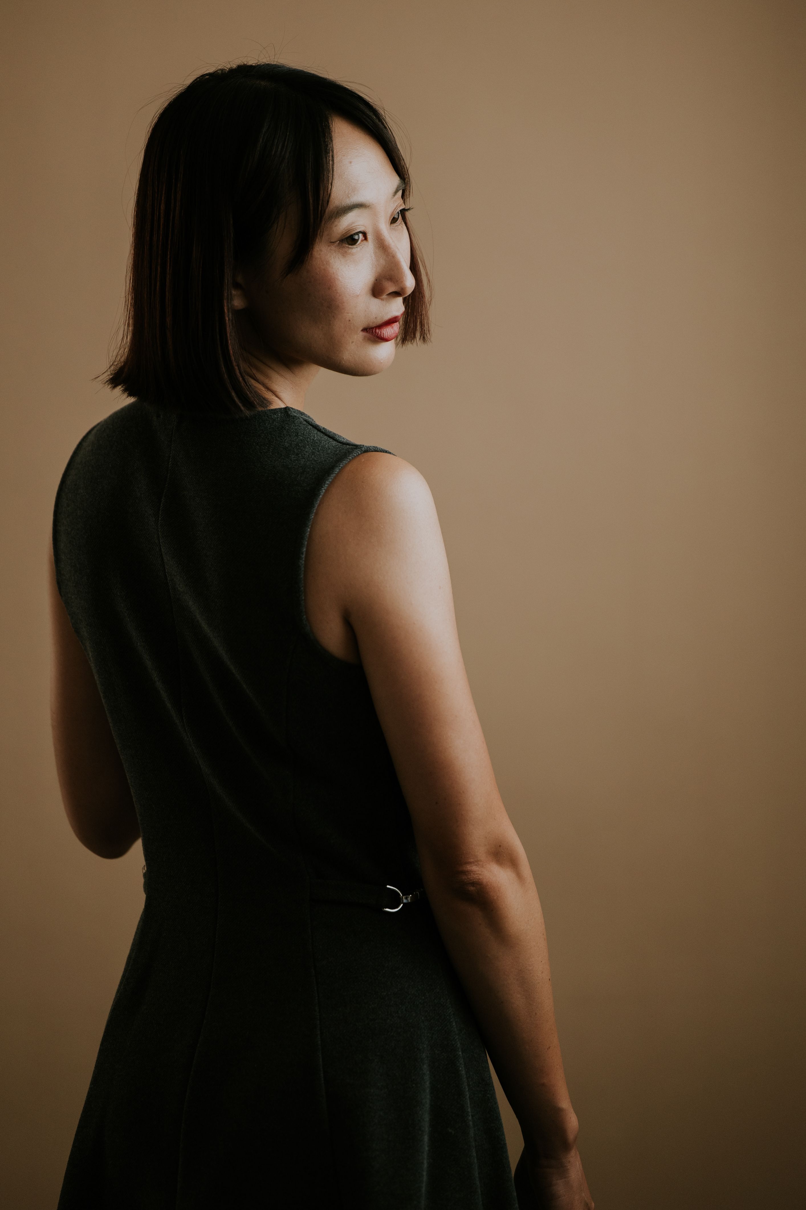 Elegant Portrait of Woman in Minimalist Setting · Free Stock Photo