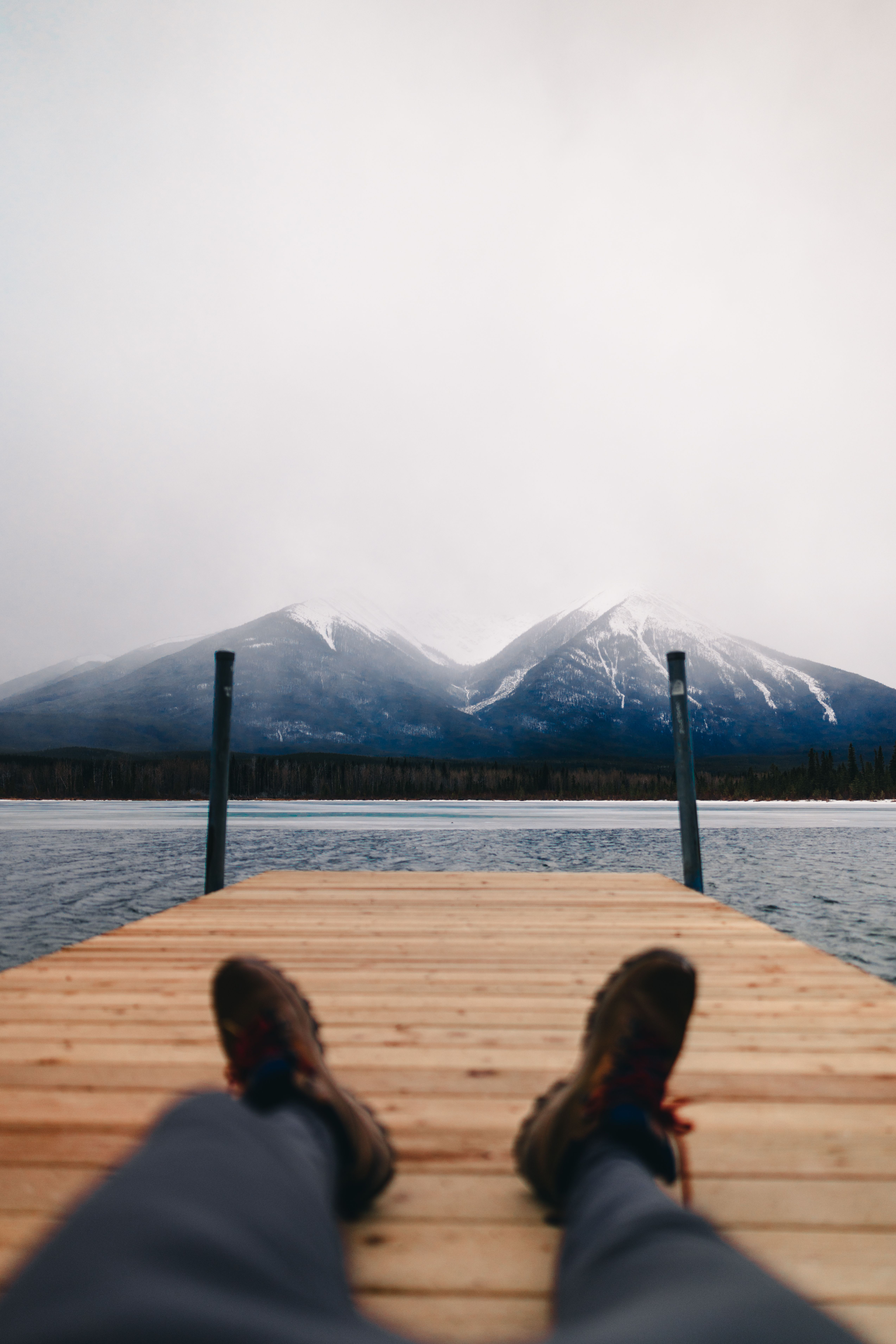 Relaxing on a Dock with Mountain View in Banff · Free Stock Photo