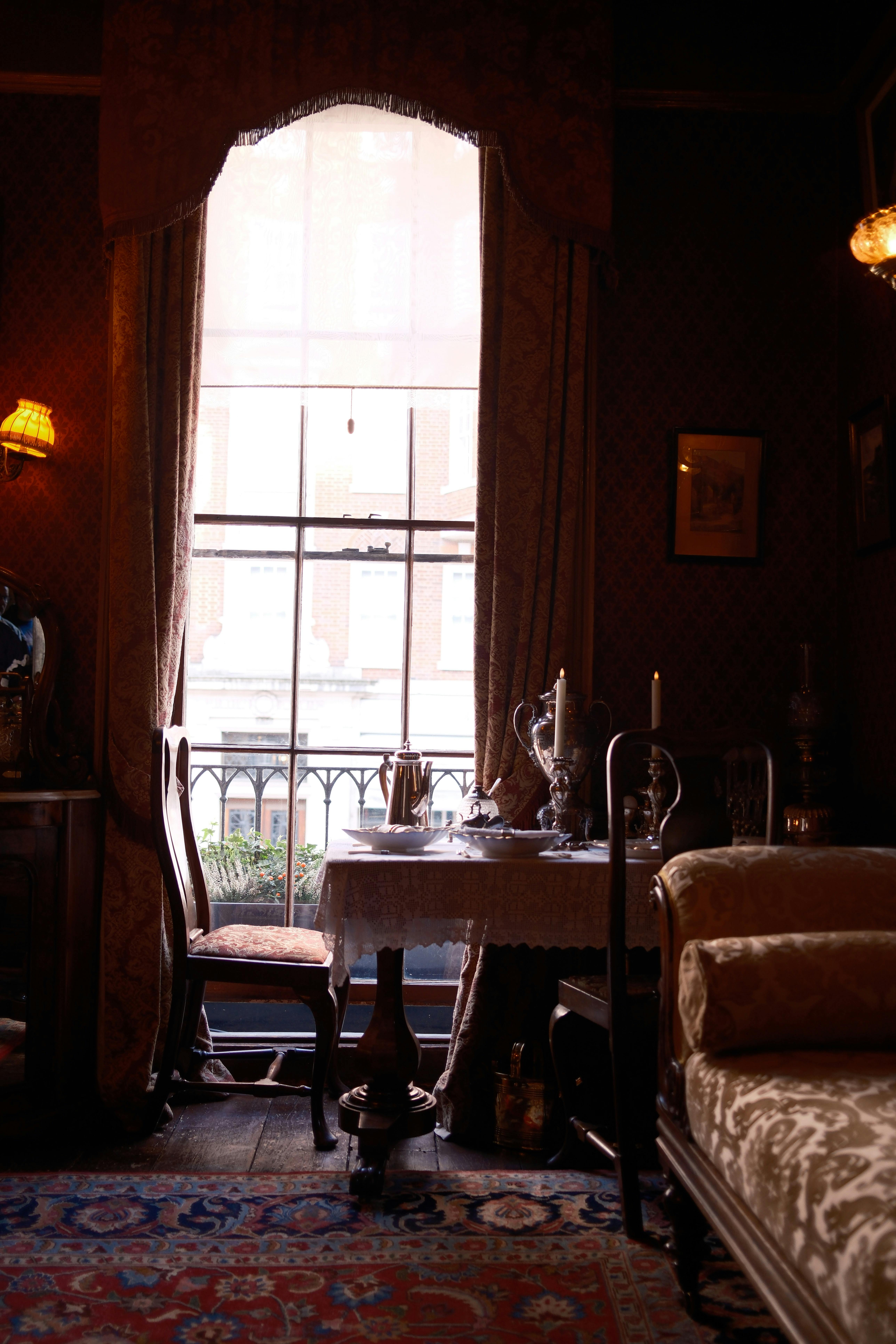 Classic vintage room with elegant furnishings and warm lighting.