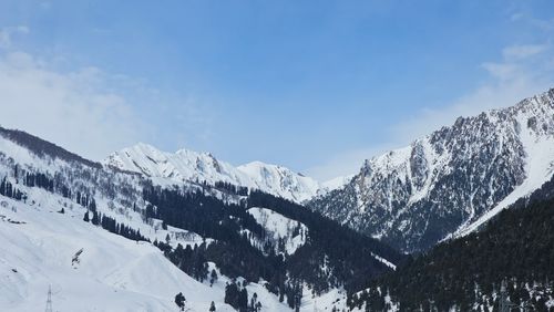 Free Explore the serene, snowy landscape of Sonamarg with majestic mountains under a clear blue sky. Stock Photo