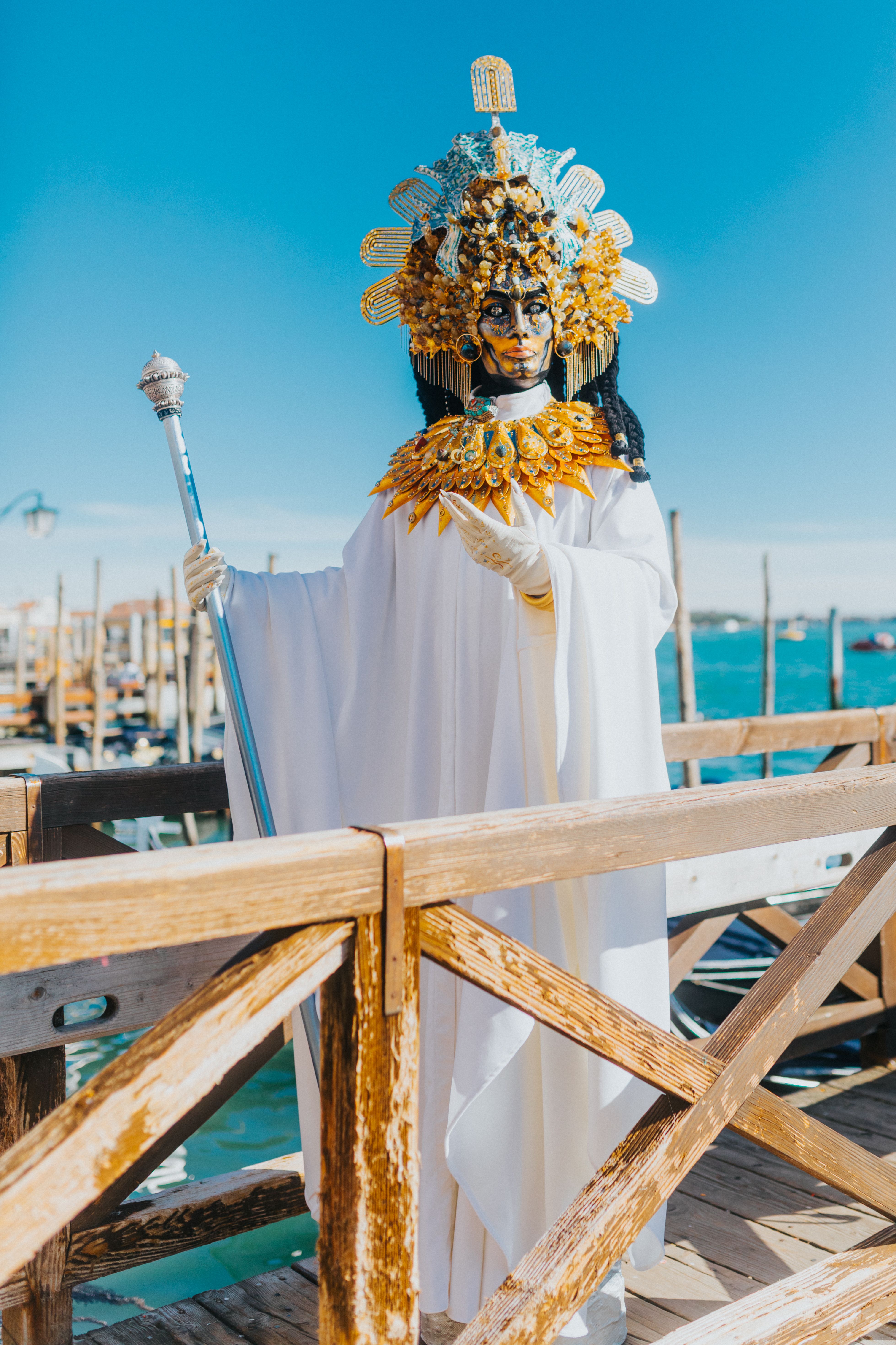 Elegant Venetian Carnival Costume on a Pier · Free Stock Photo