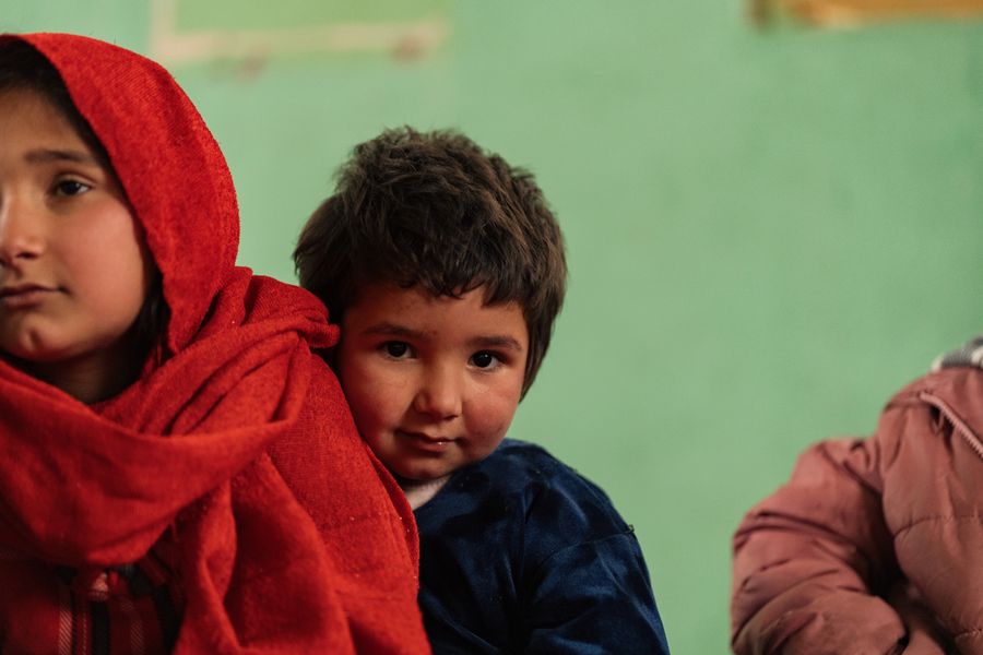Afghan children in a community learning room