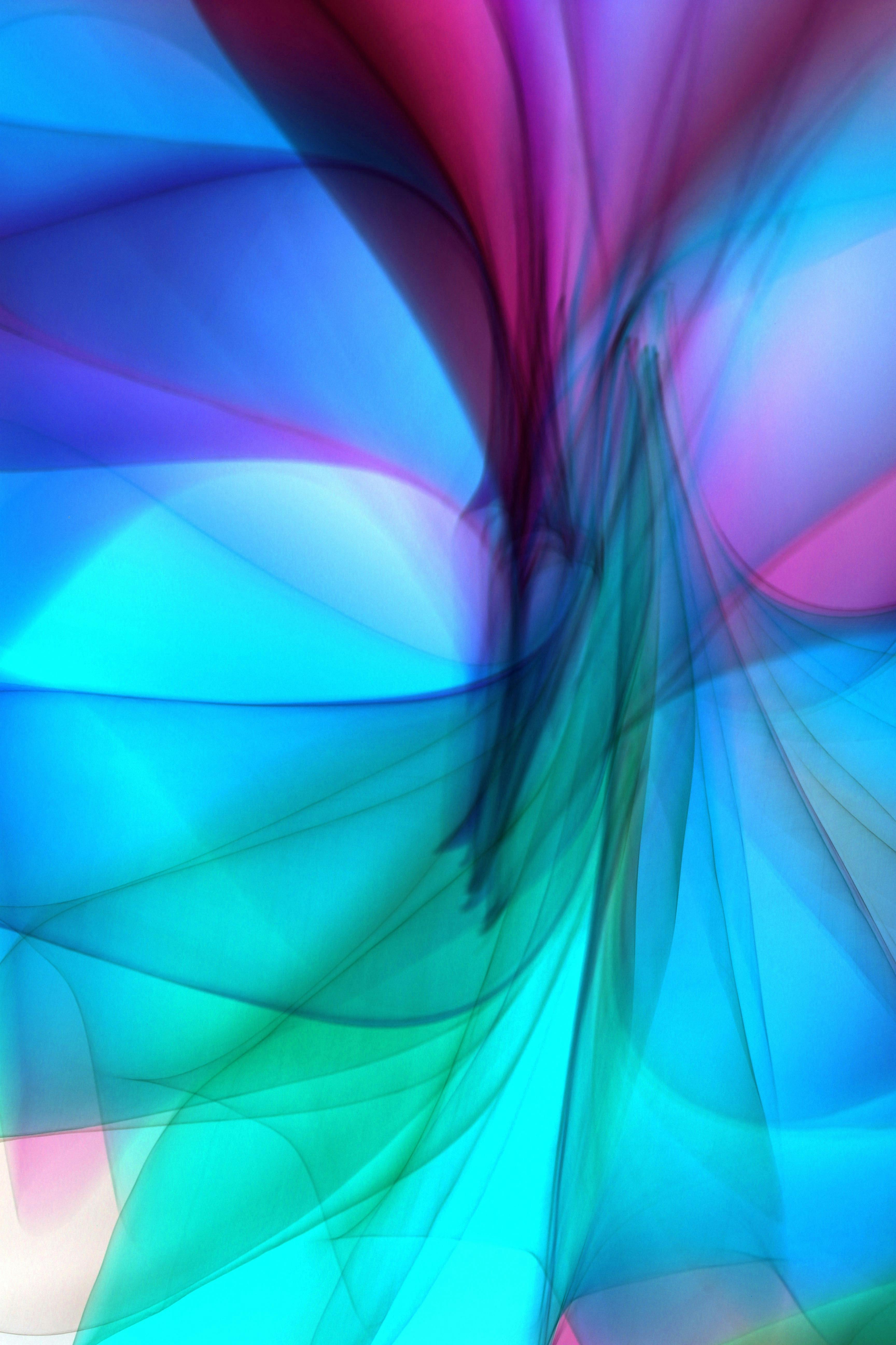 Free Dynamic abstract design with vivid swirling colors creating an energetic visual effect. Stock Photo