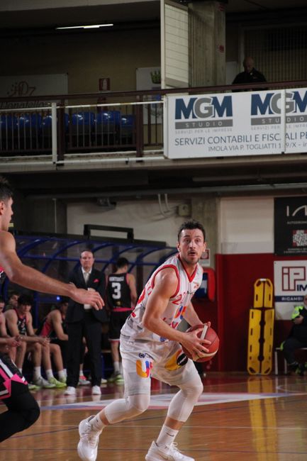 Devin Carter demonstrating elite defensive skills while guarding a perimeter player.
