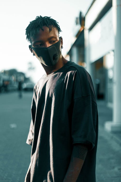 Free Man Wearing Black Face Mask Stock Photo