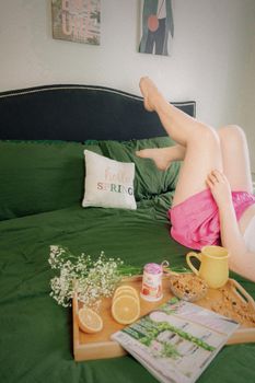 A leisurely spring morning with breakfast in bed and vibrant decor, creating a warm, relaxed atmosphere.