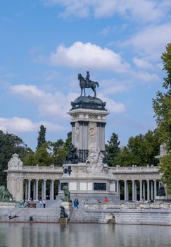 View of the Monument to Alfonso XII at Retiro Park in Madrid, a popular Spanish landmark.