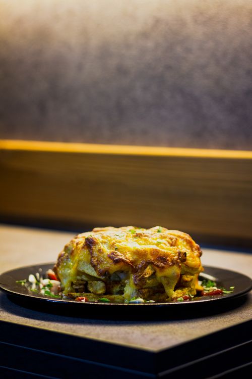 Free Mouthwatering homemade lasagna with melted cheese and a secret special sauce. Stock Photo