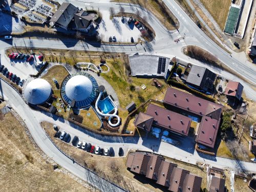 Free Bird's-eye view of modern architecture and roads in Tyrol, Austria. Stock Photo