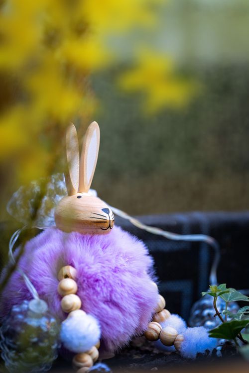 Free Cute Easter bunny figurine with soft pastel hues in a springtime decoration. Stock Photo