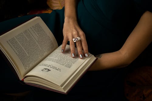 Free Person Holding Book Stock Photo