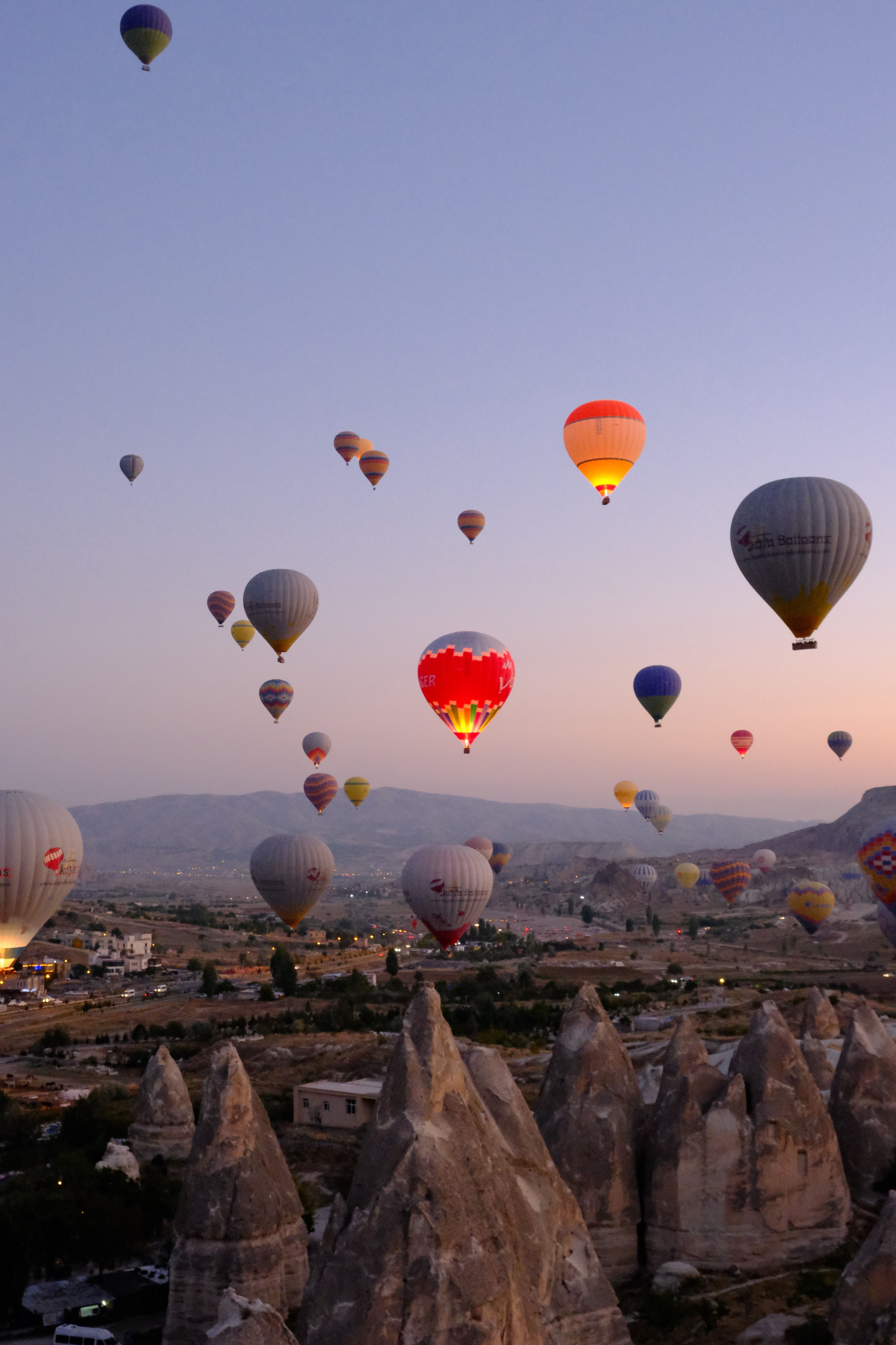Hot Air Balloons Over Cappadocia at Sunrise · Free Stock Photo