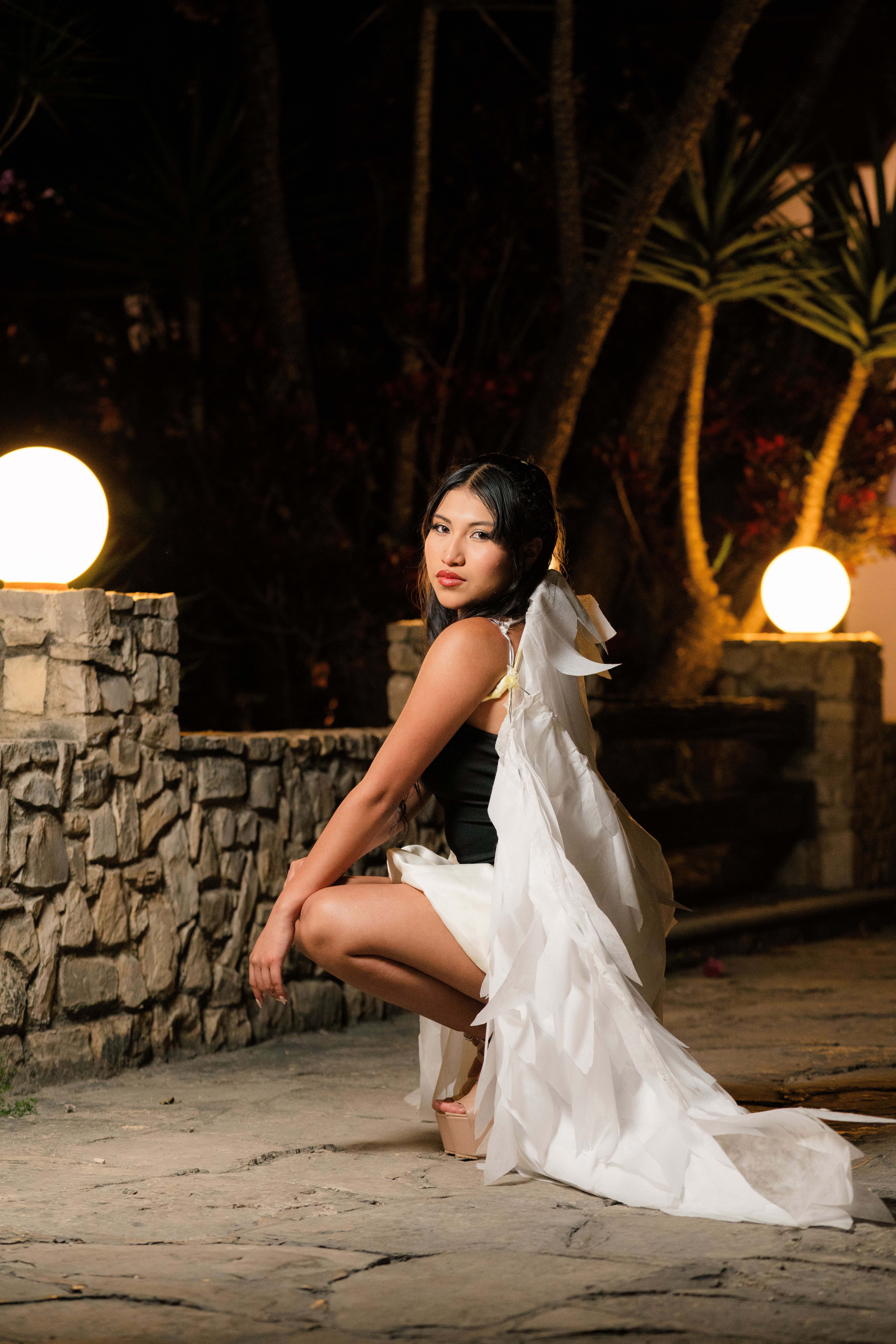 Elegant Woman Posing Outdoors at Night · Free Stock Photo