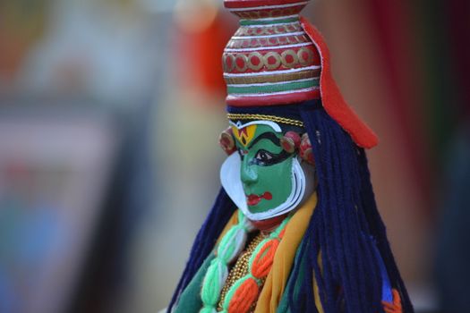 Intricate close-up of a traditional Indian folk art puppet from Surajkund Fair.